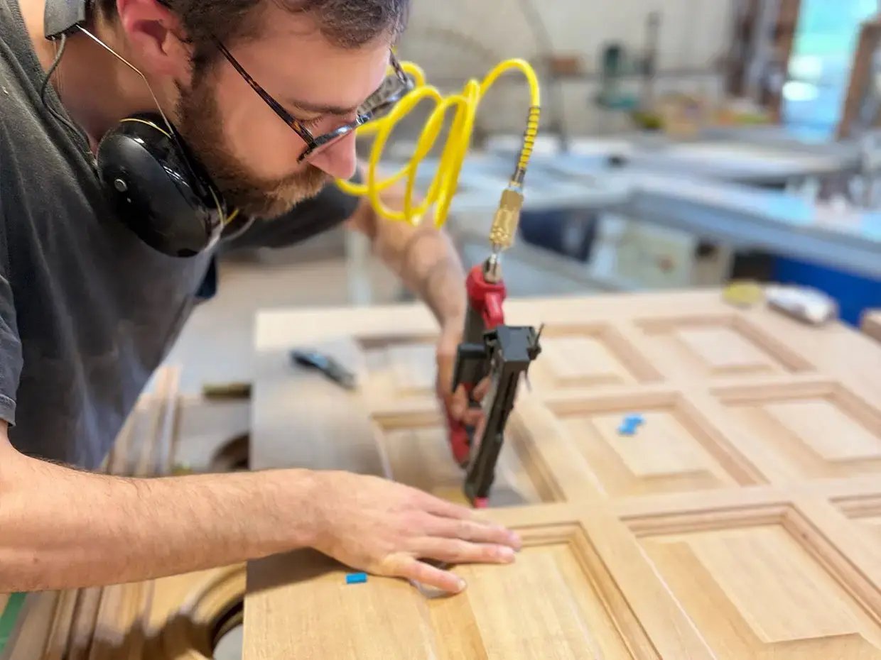 craftsman-hand-building-custom-door